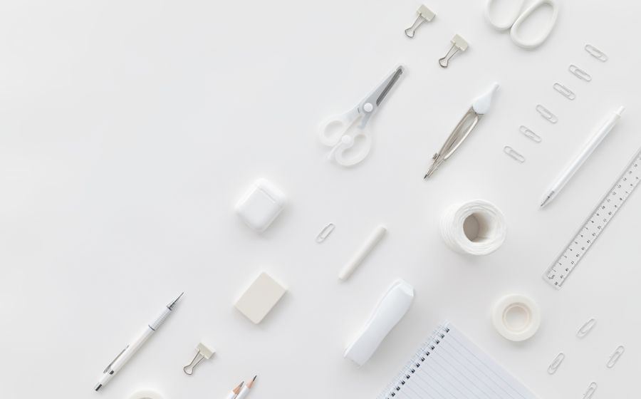 Office supplies and stationery arranged on a work surface